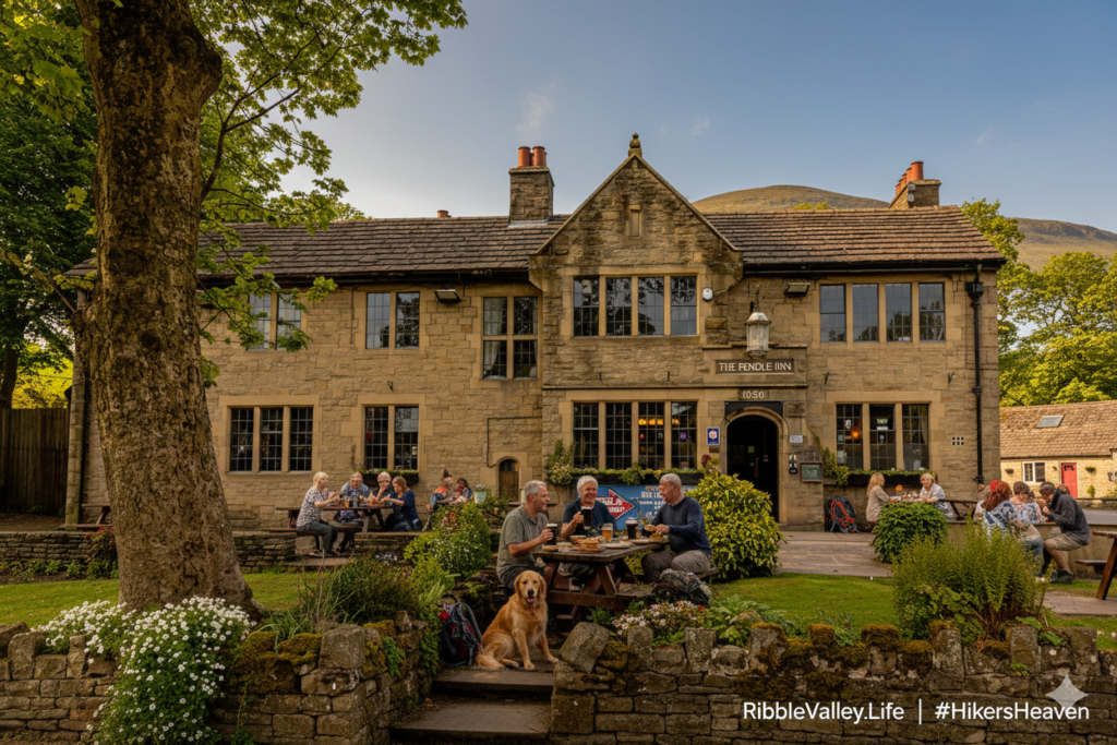 people sat in the garden at the pendle inn